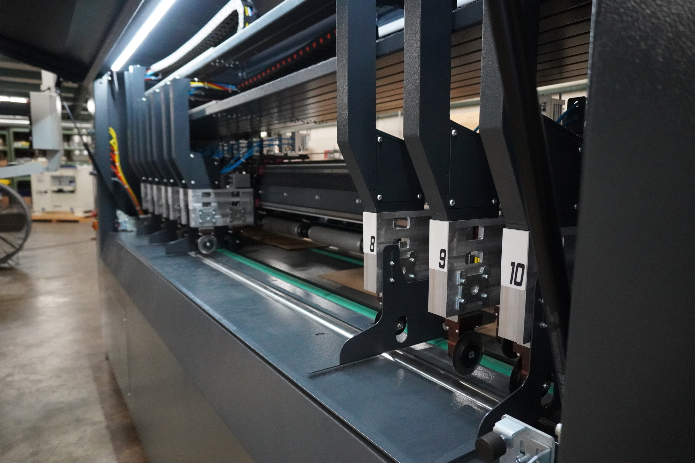 Cutting and creasing tools inside the Right Choice Box Machine