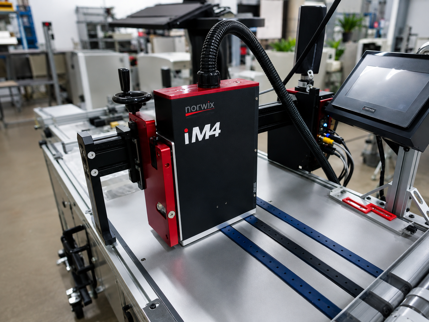Norwix iM4 inline inkjet addressing system installed on a production mail line
