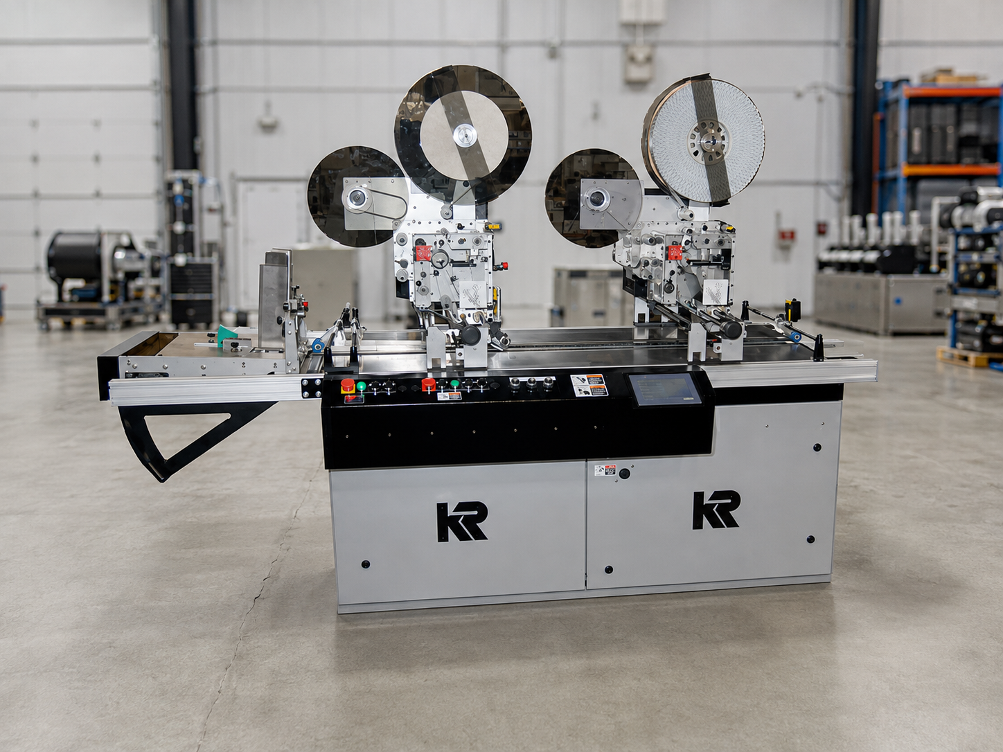 Kirk-Rudy modular label applicator with multiple label heads on a production transport