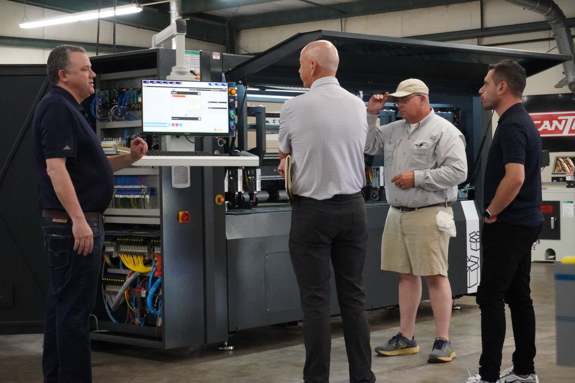 ATP team demonstrating the Right Choice Box Machine