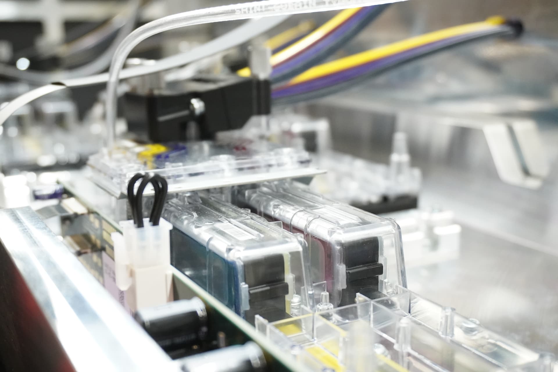 Production color digital printing system with ink cartridges and feed lines in operation